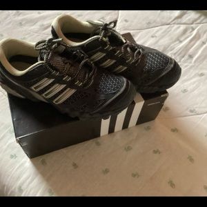 Black sneakers with slight silver trimming